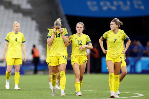 Gutted: The Matildas were holding on by a thread after a 2-1 defeat to the US in Marseilles.